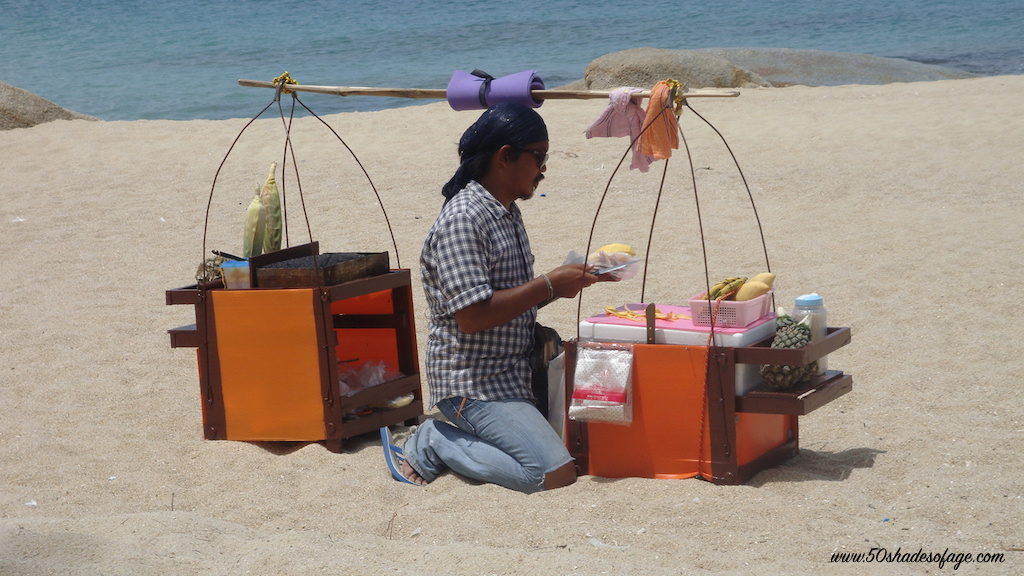 Fresh pineapple or corn on the cob on the beach in Koh Samui